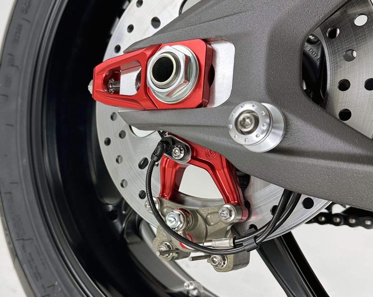 Motocorse Billet Aluminum Chain Adjuster and Rear Brake Caliper Support Bracket for Brembo Racing 64mm Brake Caliper P2-24 X206001 - Ducati Panigale / Streetfighter V4 (2025+) Motocorse Billet Aluminum Chain Adjuster and Rear Brake Caliper Support Bracket for Brembo Racing 64mm Brake Caliper P2-24 X206001 - Ducati Panigale / Streetfighter V4 (2025+)